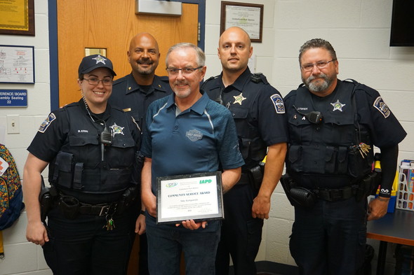 Officer Kirkpatrick and members of the Lindenhurst Police Department