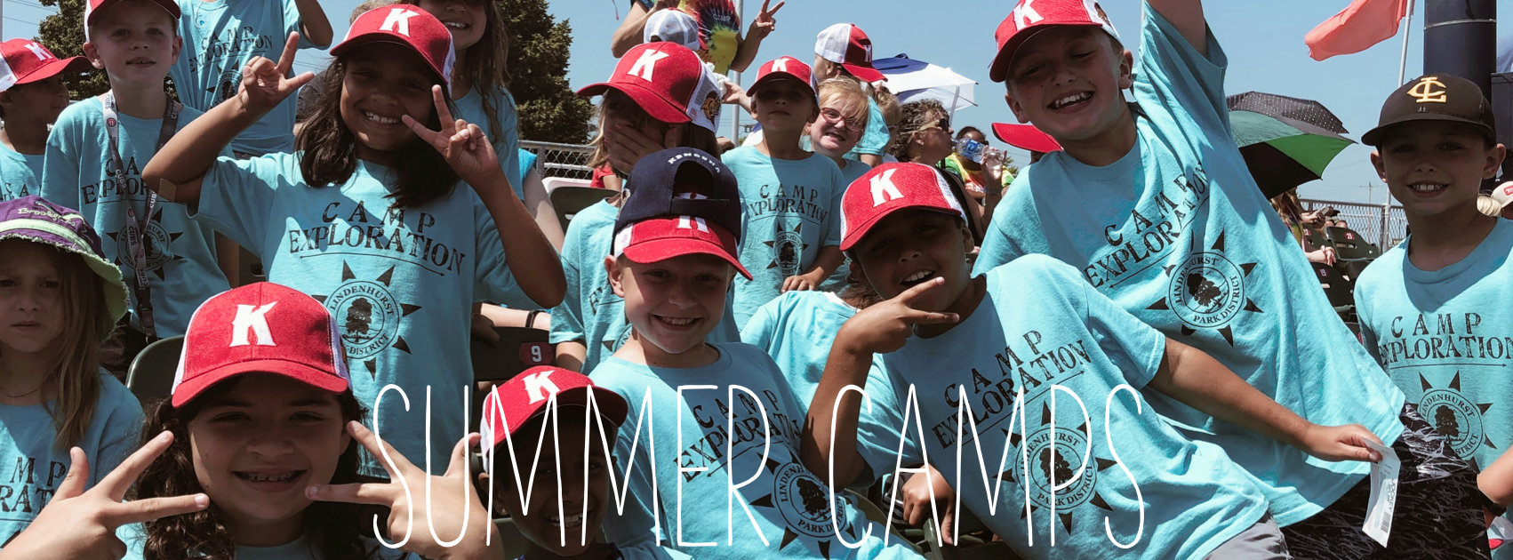 Group photo of children in "Camp Explorers" shirts