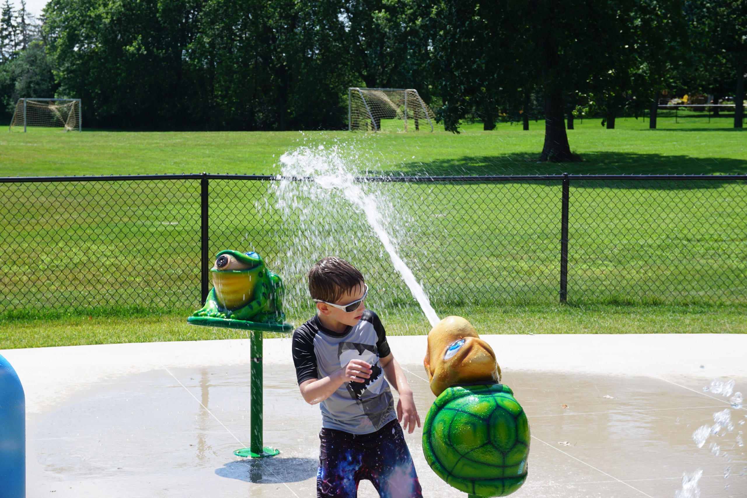 Child enjoying the Oak Ridge Park & Spray 'N Play
