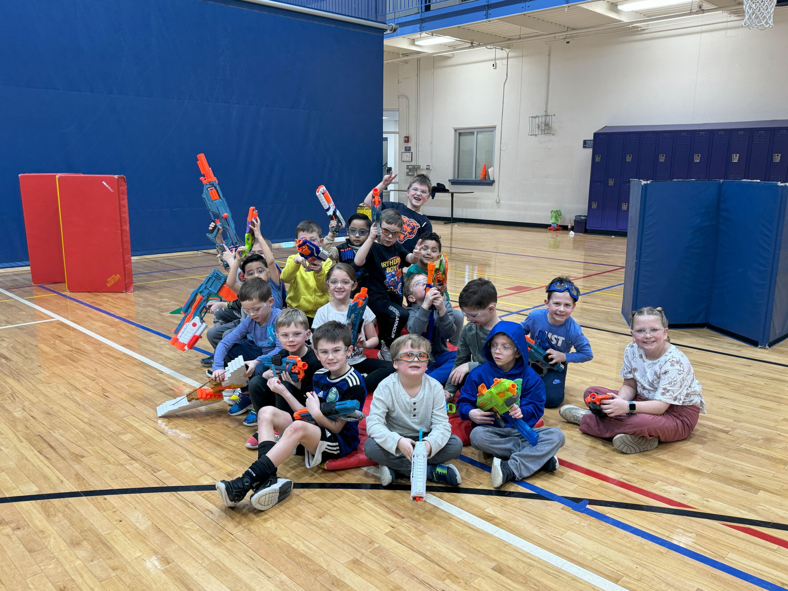 Group of young kids posing with their Nerf guns